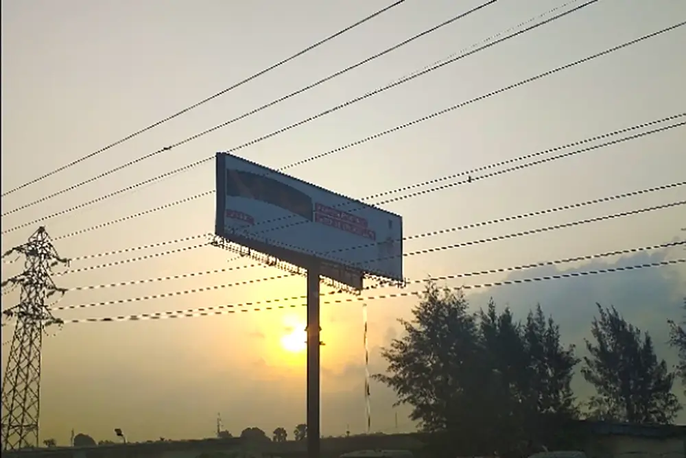 Unipole billboard - Along Mile 2