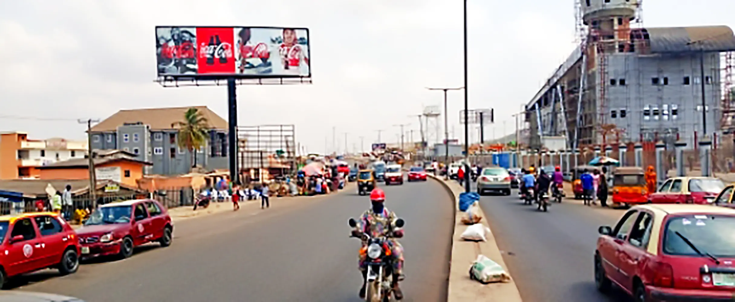 Unipole billboard - By Ojo Roundabout Facing Traffic To Oyo